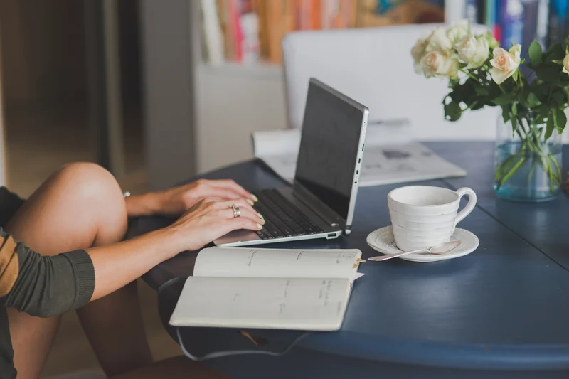 Freelancer working on a laptop at a desk